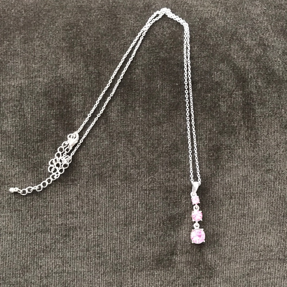 Pink stone necklace.